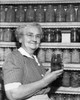 Close-up of a senior woman holding a jar of pickles Poster Print - Item # VARSAL25518940