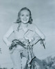 Portrait of young woman riding bike outdoors Poster Print - Item # VARSAL255417324