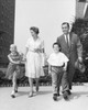 Mature couple walking with their son and daughter Poster Print - Item # VARSAL25519338B