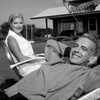 Mature couple relaxing in backyard Poster Print - Item # VARSAL25548889
