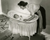 Mother looking at her baby lying in a bassinet Poster Print - Item # VARSAL2559789