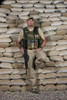 A U.S. police officer contractor leans against his bunker in Afghanistan Poster Print - Item # VARPSTTMO100492M