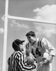 Football player arguing with a referee Poster Print - Item # VARSAL25521330