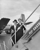 Senior couple standing on the staircase of an airplane Poster Print - Item # VARSAL2555929B