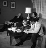 People relaxing in living room Poster Print - Item # VARSAL255418060