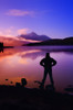 Silhouette Of A Man At A Mountain Lake PosterPrint - Item # VARDPI1801600