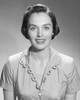 Studio portrait of young woman smiling Poster Print - Item # VARSAL25510534F