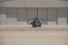 A lone UH-60 Black Hawk helicopter parked in front of a hanger at Davis-Monthan Air Force Base, Arizona Poster Print - Item # VARPSTTMO101011M