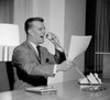 Side profile of a businessman talking on the telephone Poster Print - Item # VARSAL2556558
