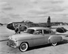 Vintage car near an airplane on a runway Poster Print - Item # VARSAL25540132