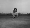 Mid adult woman playing golf on a golf course Poster Print - Item # VARSAL2558895