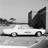 Police car in car park Poster Print - Item # VARSAL255420519