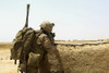 May 15, 2014 - U.S. Marine takes cover behind a wall during a reconnaissance patrol near Patrol Base Boldak in Helmand province, Afghanistan. Poster Print - Item # VARPSTSTK108637M