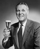 Portrait of a mature man holding a glass of beer Poster Print - Item # VARSAL25512684B