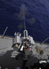 Philippine Sea, July 19, 2011 - Gunner fires a Mark 38 25mm machine gun during a training exercise aboard submarine tender USS Frank Cable. Poster Print - Item # VARPSTSTK104753M