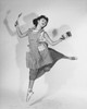 Young woman holding kitchen utensils and dancing Poster Print - Item # VARSAL25514616
