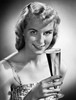 Portrait of a young woman holding a glass of beer Poster Print - Item # VARSAL25512683B
