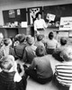 Teacher teaching students in a classroom Poster Print - Item # VARSAL2559976