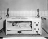 Baby sleeping in an incubator Poster Print - Item # VARSAL25533885