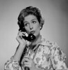 Mid adult woman talking on the phone Poster Print - Item # VARSAL255416816