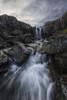 Stream flows over a waterfall along the eastern coast of Iceland; Iceland PosterPrint - Item # VARDPI12296398