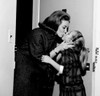 Mother kissing daughter goodbye Poster Print - Item # VARSAL255417756