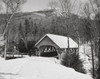 Snow covered road leading to a covered bridge  Old Lattice Covered Bridge  Pemigewasset River  Franconia Notch State Park  New Hampshire  USA Poster Print - Item # VARSAL25536071