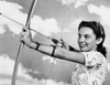 Young woman aiming a bow and arrow Poster Print - Item # VARSAL25522447