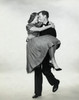Young man carrying a young woman Poster Print - Item # VARSAL2555799