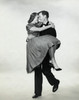 Young man carrying a young woman Poster Print - Item # VARSAL2555799