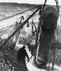 Two construction workers at a construction site of pipeline  Trans-Alaskan Pipeline  Alaska  USA Poster Print - Item # VARSAL25535613