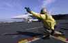 A shooter signals the launch of an F/A-18 Super Hornet Poster Print - Item # VARPSTSTK104341M