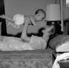 Mother playing with baby on bed Poster Print - Item # VARSAL2556005