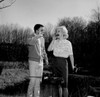 Young couple eating barbecue on picnic Poster Print - Item # VARSAL255416378