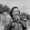 Portrait of young woman with tennis racket Poster Print - Item # VARSAL255421113
