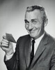 Man in suit holding a check Poster Print - Item # VARSAL25534237