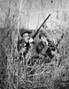 Two young men holding guns and hunting Poster Print - Item # VARSAL25524442