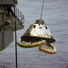 March 13, 1969 - The Apollo 9 Command Module, with flotation collar still attached, is hoisted aboard the prime recovery ship, USS Guadalcanal, during recovery operations. Poster Print - Item # VARPSTSTK203928S