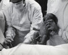 Mid section view of a doctor holding a newborn baby Poster Print - Item # VARSAL9902201A