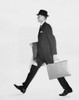 Side profile of a businessman carrying a briefcase and an overcoat Poster Print - Item # VARSAL25541642