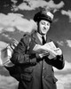 Low angle view of a postman holding mail Poster Print - Item # VARSAL2559068