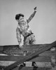 Boy standing on fence  waving Poster Print - Item # VARSAL25512749