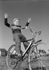 Boy riding bicycle with arms raised Poster Print - Item # VARSAL255417009