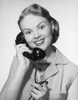 Close-up of a young woman talking on the telephone Poster Print - Item # VARSAL25544472
