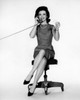 Studio portrait of woman talking on phone Poster Print - Item # VARSAL25528228A