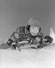 Portrait of boy laying on front  holding sleigh Poster Print - Item # VARSAL255416321