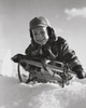 Boy sledding on snow Poster Print - Item # VARSAL25512982B