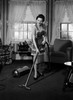 Young woman with vacuum cleaner Poster Print - Item # VARSAL255416848