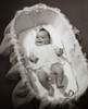 High angle view of a baby girl lying in a bassinet Poster Print - Item # VARSAL2559643