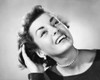 Close-up of a young woman smiling with her hand in her hair Poster Print - Item # VARSAL2552817